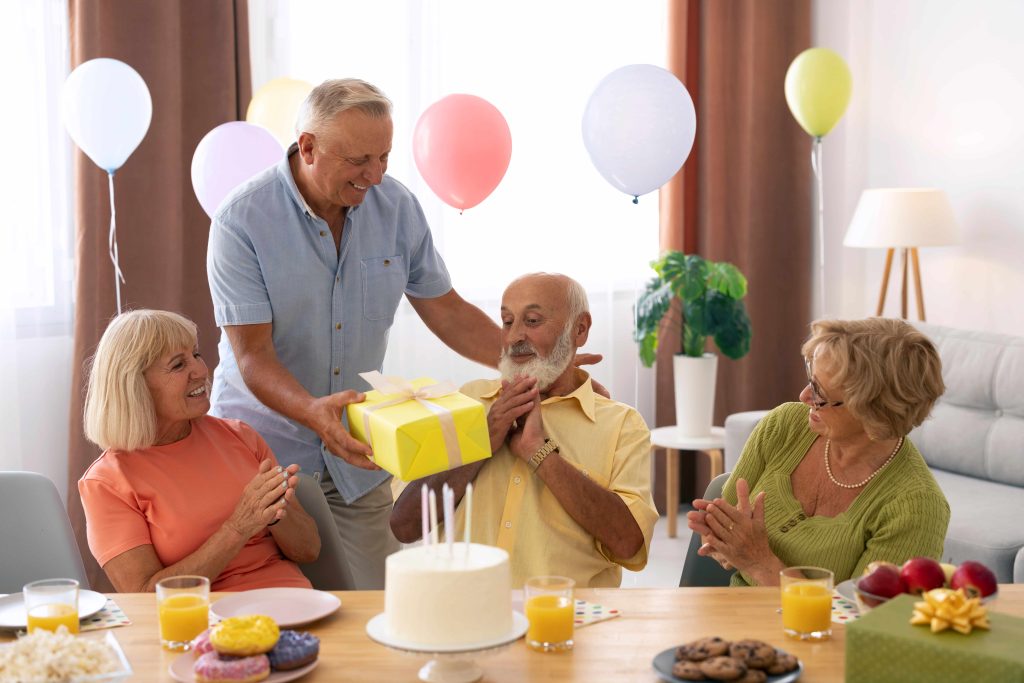 senior-people-celebrating-birthday-care-home