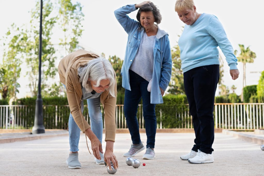 senior-residents-playing-petanque-demonstrating-emotional-needs-of-ageing-loved-ones