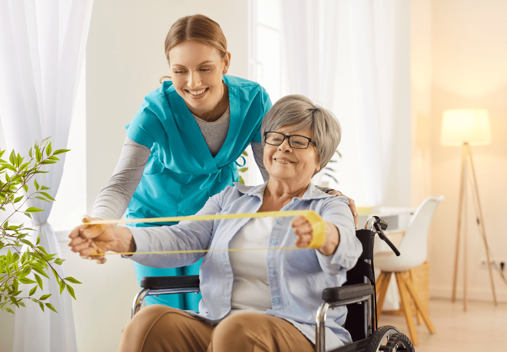 A nurse assists a woman in a wheelchair, providing support and care in a compassionate setting.