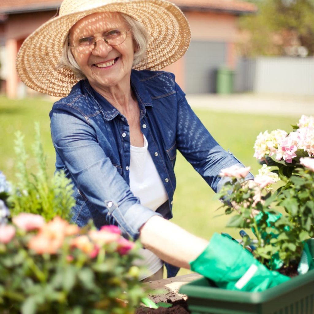 A senior woman gardening